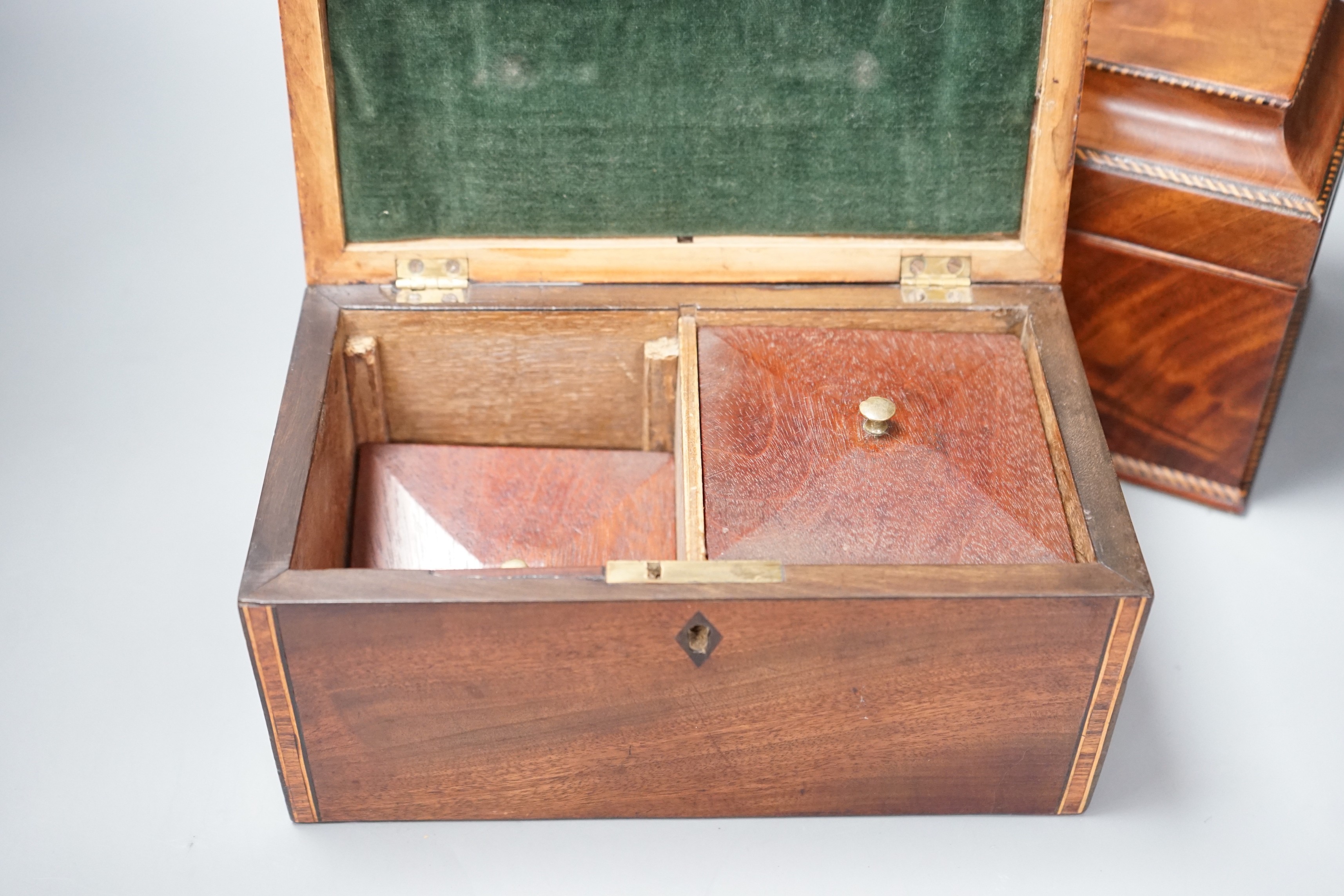 Two George III mahogany tea caddies, one with an inlaid satinwood ribbon and the other, 25cm